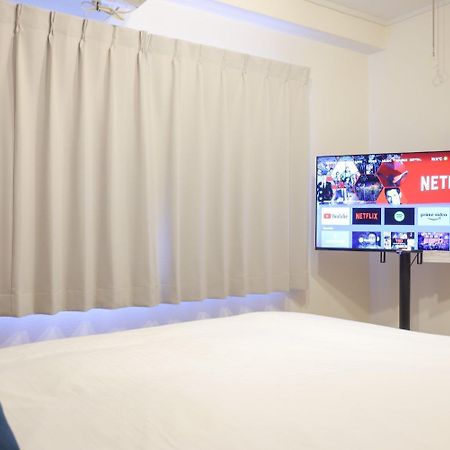 شقة Shinjuku Okada Building طوكيو المظهر الخارجي الصورة